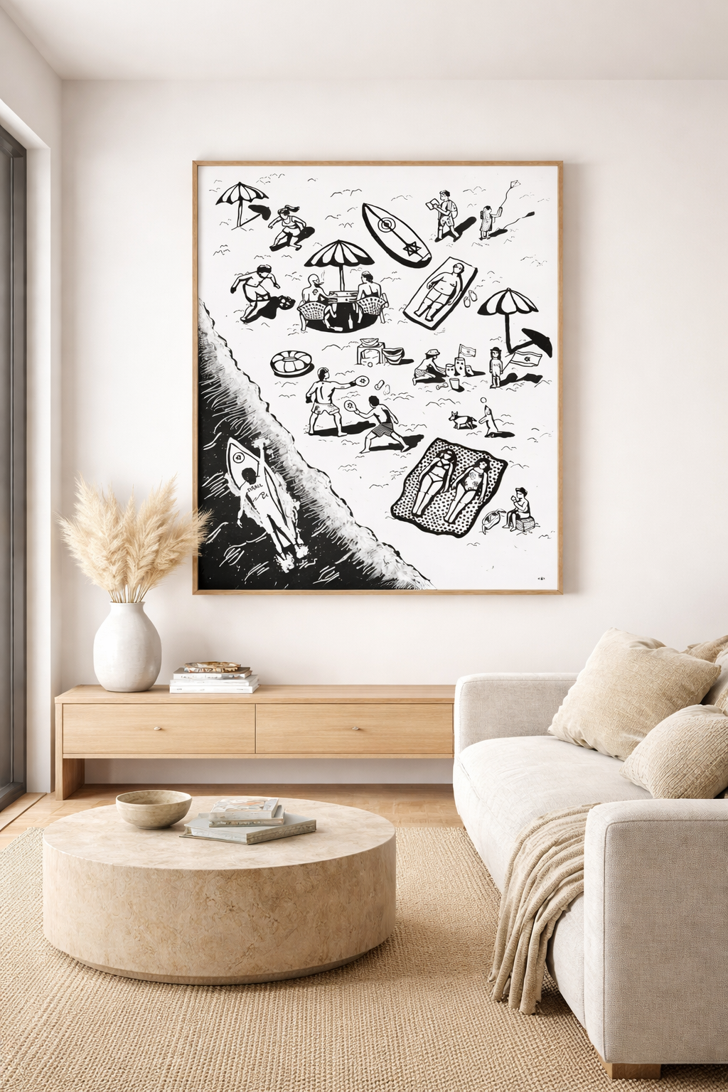 Living room with a large framed black and white artwork on the wall, a beige sofa, and a round coffee table.